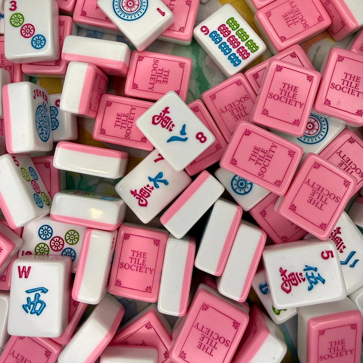 The Tile Society's signature pink-and-white Mahjong tiles